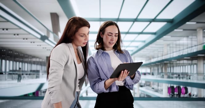Professional Businesswoman Making Financial Decisions Using Tablet in Office