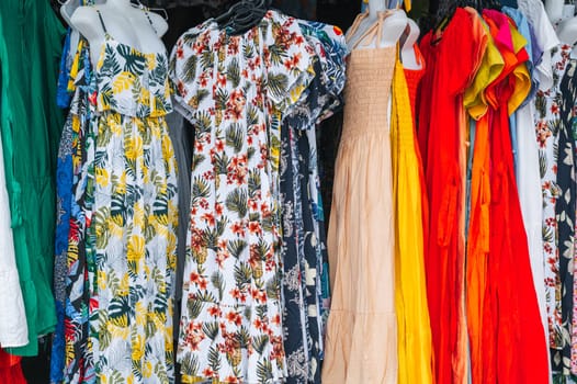 women's multicolored dresses at the East Asian street market
