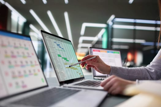 Busy Businesswoman Juggling Gantt Software Project And Digital Agenda