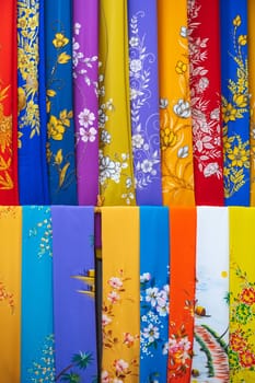 colorful silk scarves on the Asian market in Vietnam
