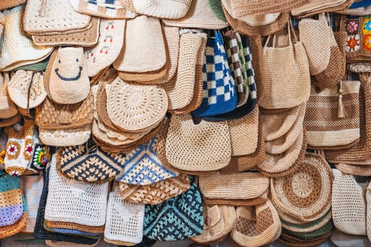 summer beach woven female bags on the counter shop in Asian market in Vietnam