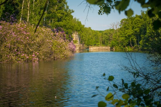 Kapellen, Belgium, June 2023: View at Fort Ertbrand and fort moat in Kapellen, Belgium