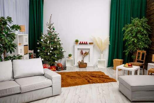 A stunningly beautifully decorated living room adorned with a magnificent Christmas tree and cozy, inviting furniture