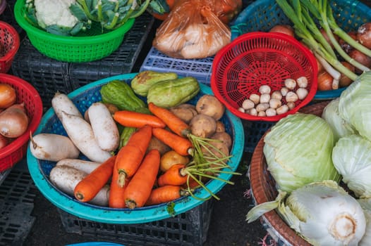 assortment of vegetables at the street grocery and vegetable market in Asia in Vietnam
