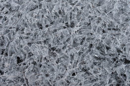 Frozen stream and ice closeup photo. Beautiful winter abstract background in nature. Concept for water and winter time