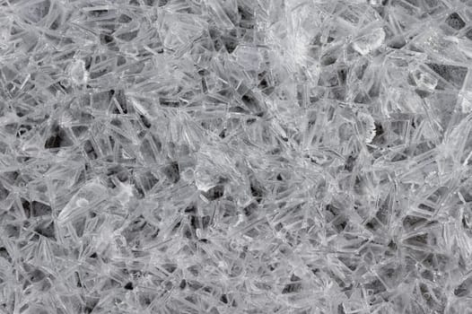 Frozen stream and ice closeup photo. Beautiful winter abstract background in nature. Concept for water and winter time