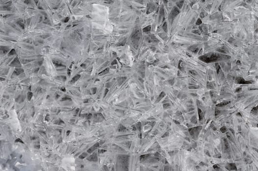 Frozen stream and ice closeup photo. Beautiful winter abstract background in nature. Concept for water and winter time