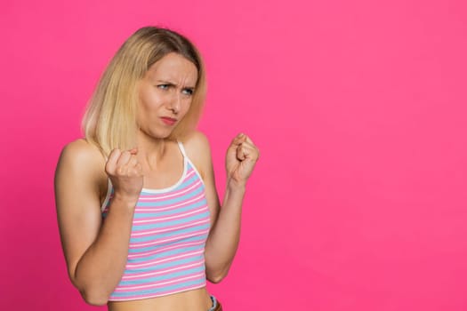 Upset frustrated annoyed Caucasian woman after lose, failure, expressing disbelief irritation, feeling bored, disappointed in result, bad news negative stress emotion. Girl isolated on pink background