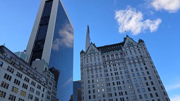 City skyline featuring modern and classic architecture, with prominent skyscrapers and urban buildings with colorful bright colors, capturing the essence of metropolitan life and architectural diversity.