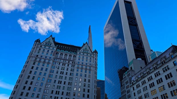 City skyline featuring modern and classic architecture, with prominent skyscrapers and urban buildings with colorful bright colors, capturing the essence of metropolitan life and architectural diversity.