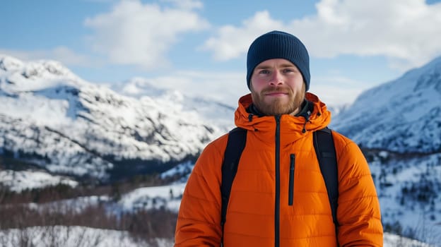 Travel, hiking, adventure, portrait of happy traveler hiker young man in jacket stands on top of mountain looking at camera