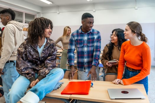 Diverse group of university students engaging in teamwork, discussing ideas and working together on a project in a classroom setting