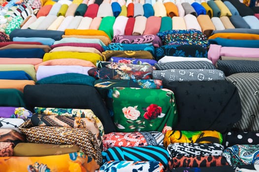 clothing and fabrics at textile market bazaar in Asia in Vietnam