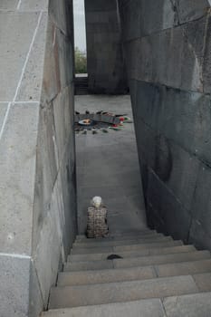 Armenia, Yerevan, April 2023 A woman in a memorial complex to the victims of the Armenian Genocide