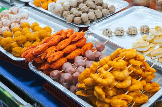 fast food at the Asian night market in Vietnam. Traditional Vietnamese street food on the counter in Asia