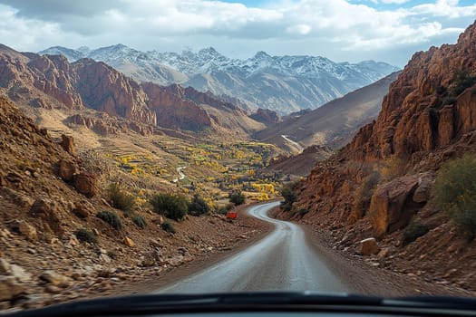 View from the car window onto a deserted mountain serpentine. Travel concept