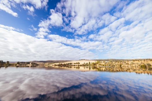 Dunrobin Bridge views of Meadowbank Lake and River Derwent on a cool summer's morning near Ouse in Tasmania, Australia