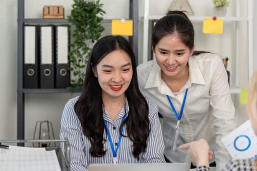 A diverse group of professionals collaborates on tax strategies, highlighting teamwork and effective communication in a business environment.