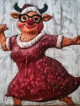 This whimsical painting features a cow with human-like attributes. The cow is wearing glasses and a patterned dress, all rendered with textured strokes on a vertically lined background.