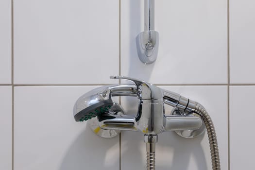 This stylish shower mixer has a sleek chrome finish and a wallmounted design, ideal for modern bathrooms