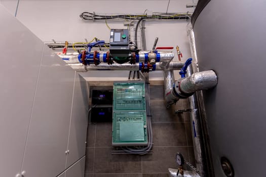 An intricate depiction of a contemporary industrial water management system incorporating pipes and various equipment