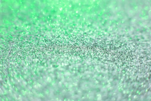 Beautiful green decorative abstract blurred christmas background. Copy space
