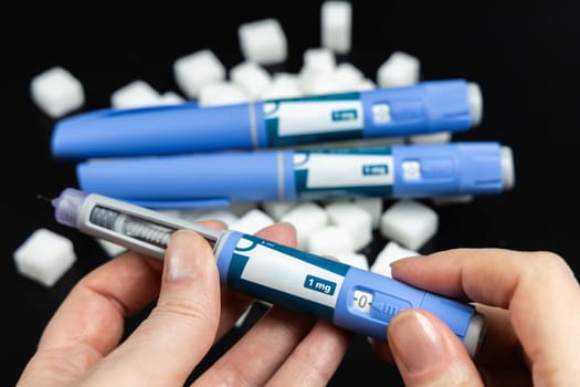 Ozempic Insulin injection pen on a dark background