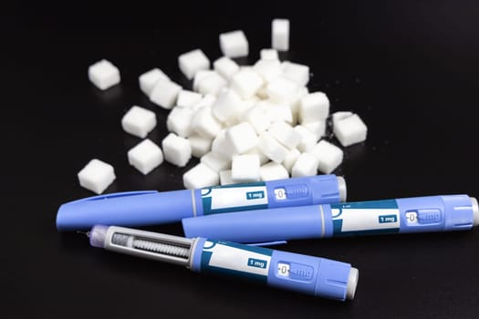 Ozempic Insulin injection pen on a dark background