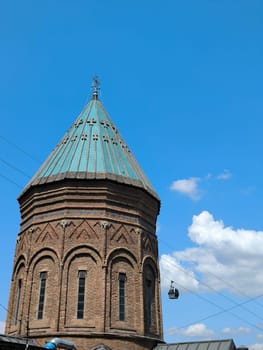 Old church religion architecture street building object construction blue sky landscape cloud city 18 August 2024 Tbilisi Georgia. High quality photo