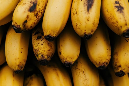 This vibrant image features a composition of bright yellow bananas stacked closely together, showcasing their rich texture and natural appeal, ideal for food-related projects.