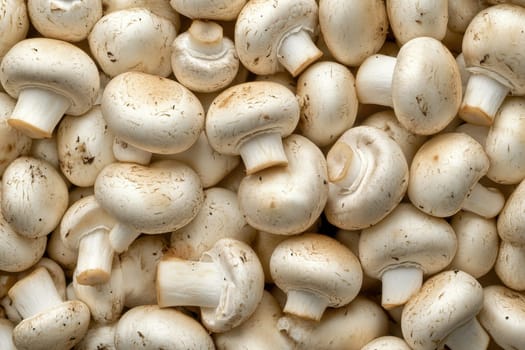A visually dynamic pile of fresh white mushrooms showcases their unique textures and natural beauty, perfect for culinary uses and healthy dishes.