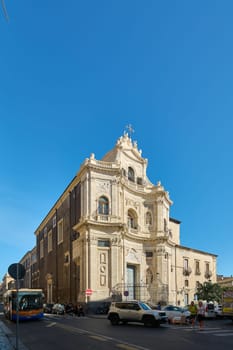 Catania, Italy - February 27, 2025: Church of San Placido adorns Catania's baroque architecture. For travel, architecture and cultural guides, it highlights the rich heritage of Sicily under.