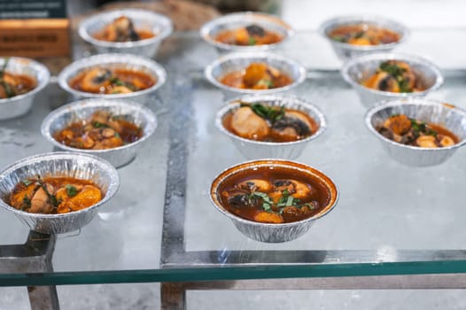 exotic Asian food duck egg balut with embryo for grilling in a buffet in an Asian night market in Vietnam