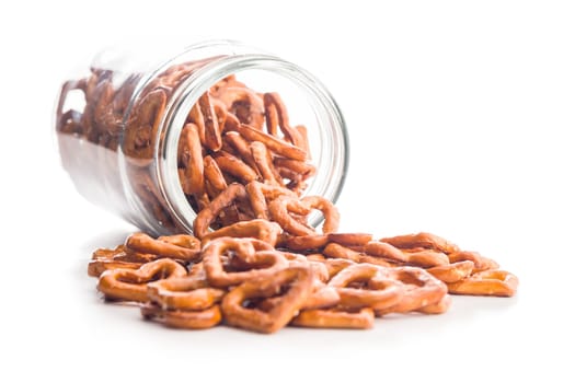 Heart shaped pretzel in jar isolated on a white background.