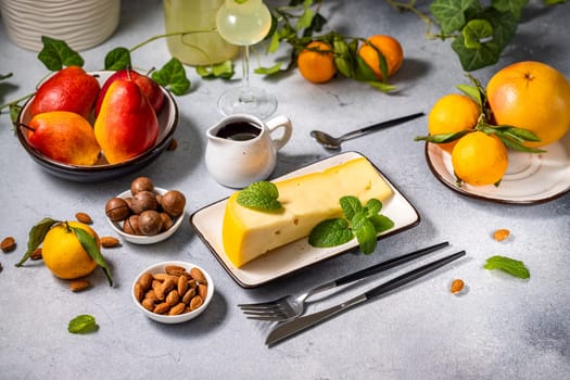 Indulge in a sophisticated culinary experience with a cheese platter, accompanied by fresh fruits, nuts, and a glass of dessert wine, creating a harmonious blend of flavors