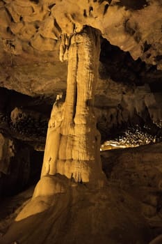 Stalagmite towers in Grottes de Betharram feature stunning geological formations highlighted by soft lighting.