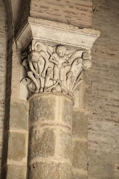 Decorative stonework highlights the rich history and artistry within Saint-Sernin basilica in Toulouse, France.