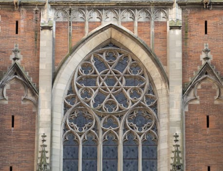 Ornamented window of a cathedral in gothic style