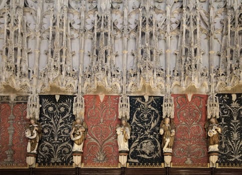Sainte-Secile cathedral features ornate carvings and sculptures in its choir stalls, showcasing exquisite artistry.