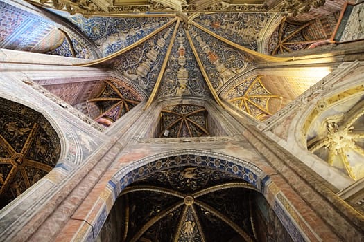 Detailed craftsmanship of the ceiling in Sainte-Secile Cathedral highlights the artistry and history of Albi, France.