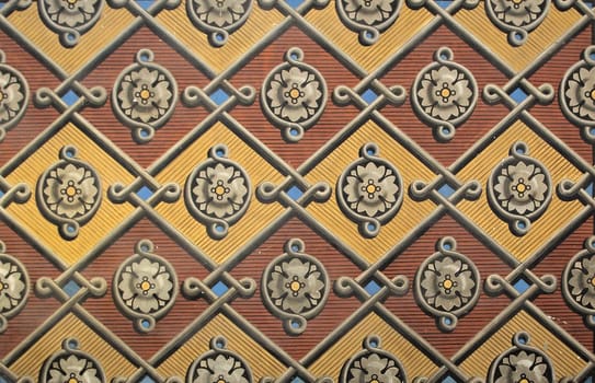 Detailed wall decoration displays vibrant patterns and motifs in Sainte-Secile Cathedral, captivating visitors in Albi.