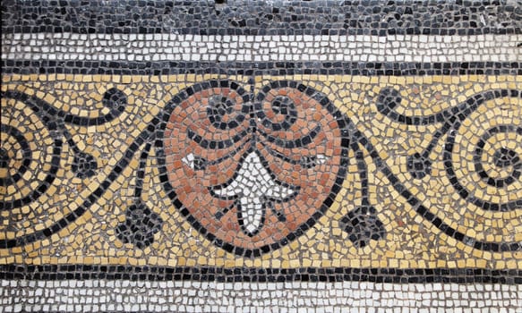 The floor of Sainte-Secile cathedral features intricate mosaics, showcasing Albi's historical craftsmanship.