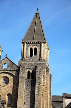Exploring Abbey Church of Sainte-Foy showcases impressive stone structure and historic design in Conques, France.