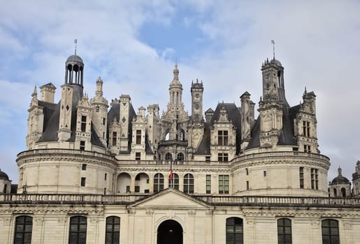 Visitors admire Chambord Castle's stunning design while exploring its historic grounds in the Loire Valley.