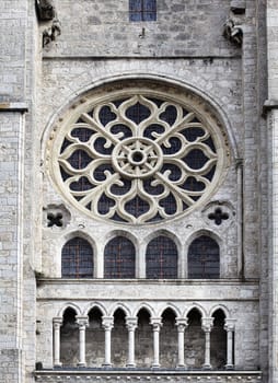 Rose window and elegant stone carvings of gothic church of Saint-Nicolas in Blois, France