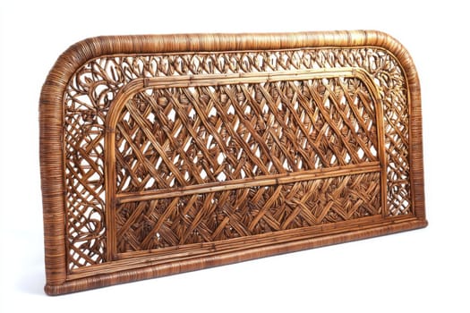 A stylish rattan headboard features beautifully woven patterns, adding a natural touch to modern bedroom interiors and design.