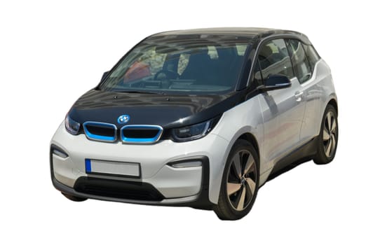 Gaziveren Cyprus -28.02.2025 A sleek electric car shines in a vibrant city, showcasing technology and sustainability under bright sunlight.
