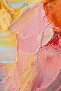 Bright fragments reveal the artistry of an oil painting, showcasing vivid hues and dynamic textures created using a palette knife technique. The swirling colors blend with an energetic feel.