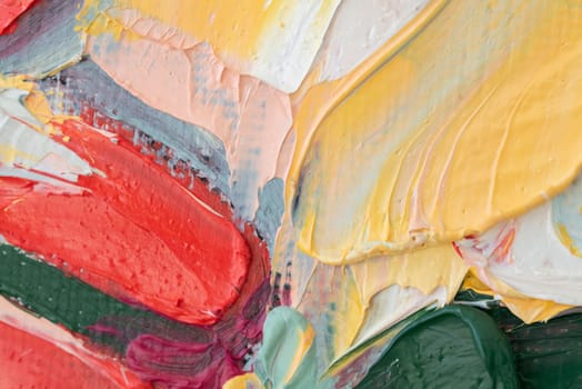 Colorful fragments of textured oil paint fill the canvas, showcasing the dynamic application of a palette knife. The rich hues blend and contrast, creating a visually captivating abstract artwork.
