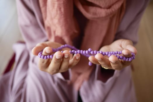 Close up of muslim women hand praying at ramadan .